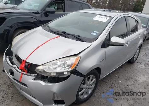 2012 Toyota Prius C Three from USA, damaged, VIN JTDKDTB37C1525061